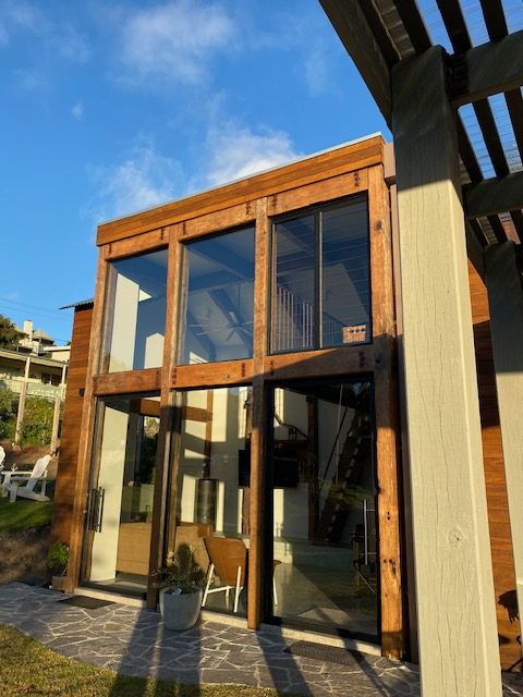 Timber-framed glazing with structural posts